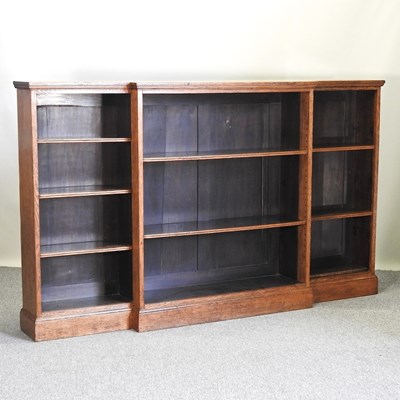 Lot 209 - A Victorian light oak dwarf breakfront open bookcase