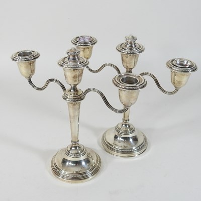 Lot 236 - A pair of silver two branch table candelabra