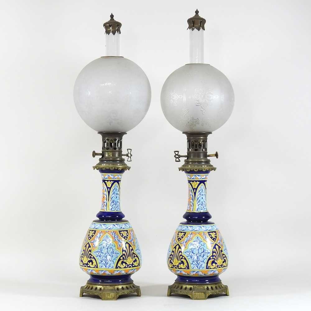 Lot 71 - A pair of late 19th century majolica oil lamps
