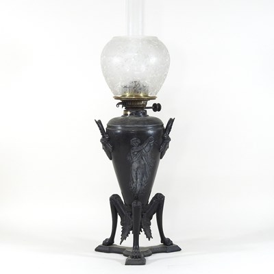 Lot 79 - A 19th century spelter oil lamp