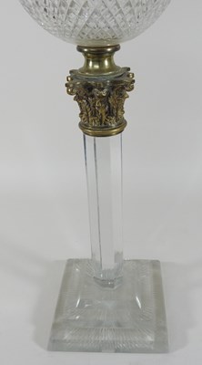 Lot 237 - A 19th century clear glass oil lamp