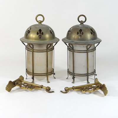 Lot 211 - A pair of Arts and Crafts pierced brass lanterns