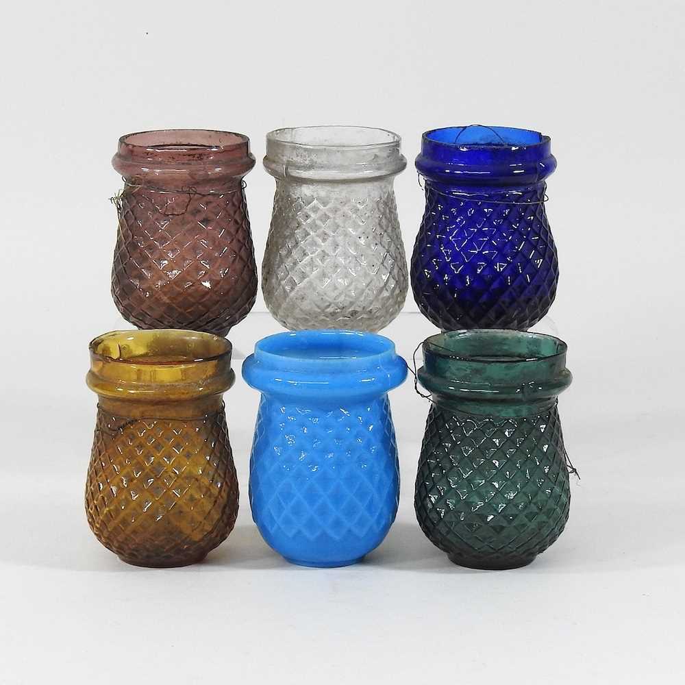 Lot 574 A collection of coloured glass tea lights