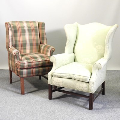 Lot 728 - A modern upholstered wing armchair