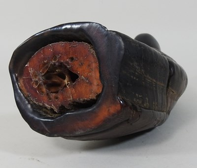 Lot 191 - A carved horn Buddha