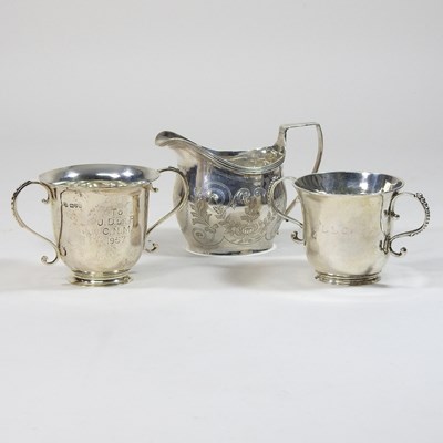 Lot 145 - A George III silver cream jug