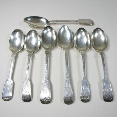 Lot 46 - A collection of George III bright cut silver table spoons