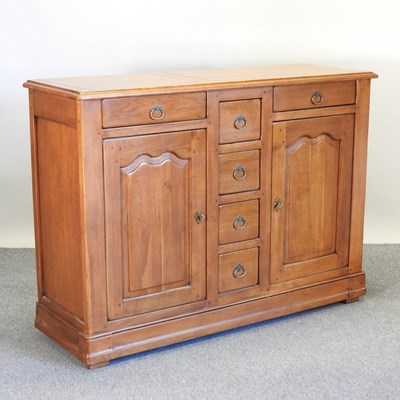 Lot 418 - A French oak sideboard