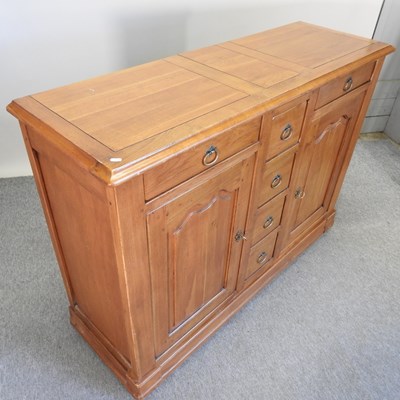 Lot 418 - A French oak sideboard