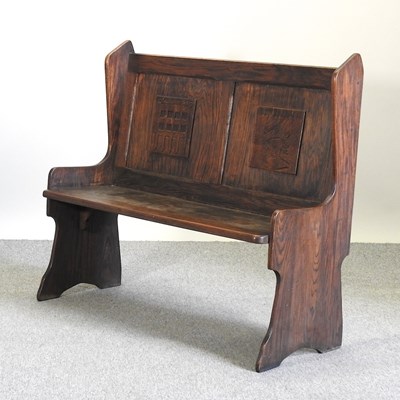 Lot 698 - A mid 20th century oak settle