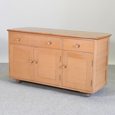 Lot 825 - A mid 20th century Ercol style sideboard