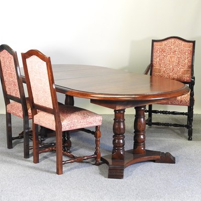 Lot 690 - A modern mahogany extending dining table