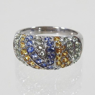 Lot 555 - A 9 carat gold sapphire cluster ring