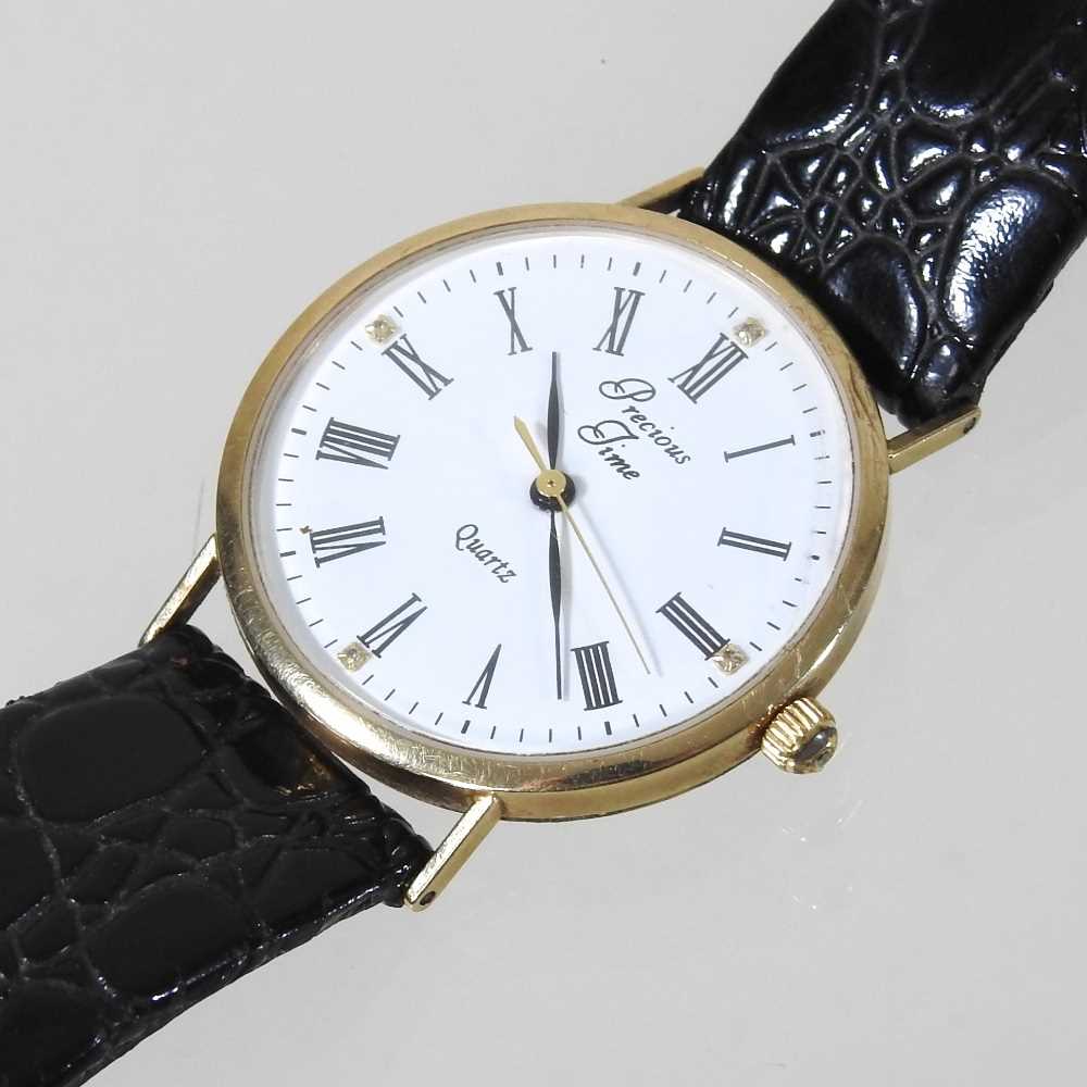 Lot 566 - A 9 carat gold cased wristwatch