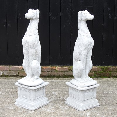 Lot 415 - A pair of reconstituted stone lurchers