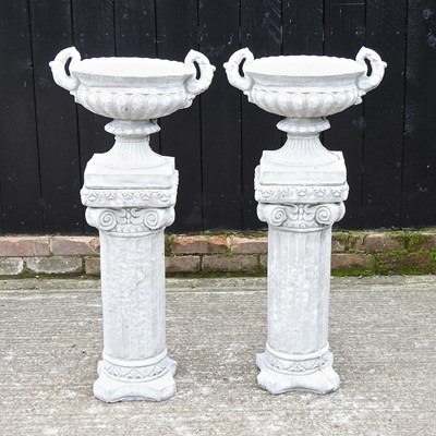 Lot 459 - A pair of reconstituted stone garden urns