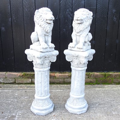 Lot 339 - A pair of reconstituted stone lions