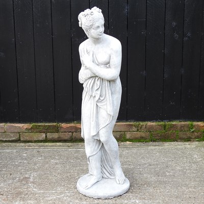 Lot 455 - A reconstituted stone garden statue