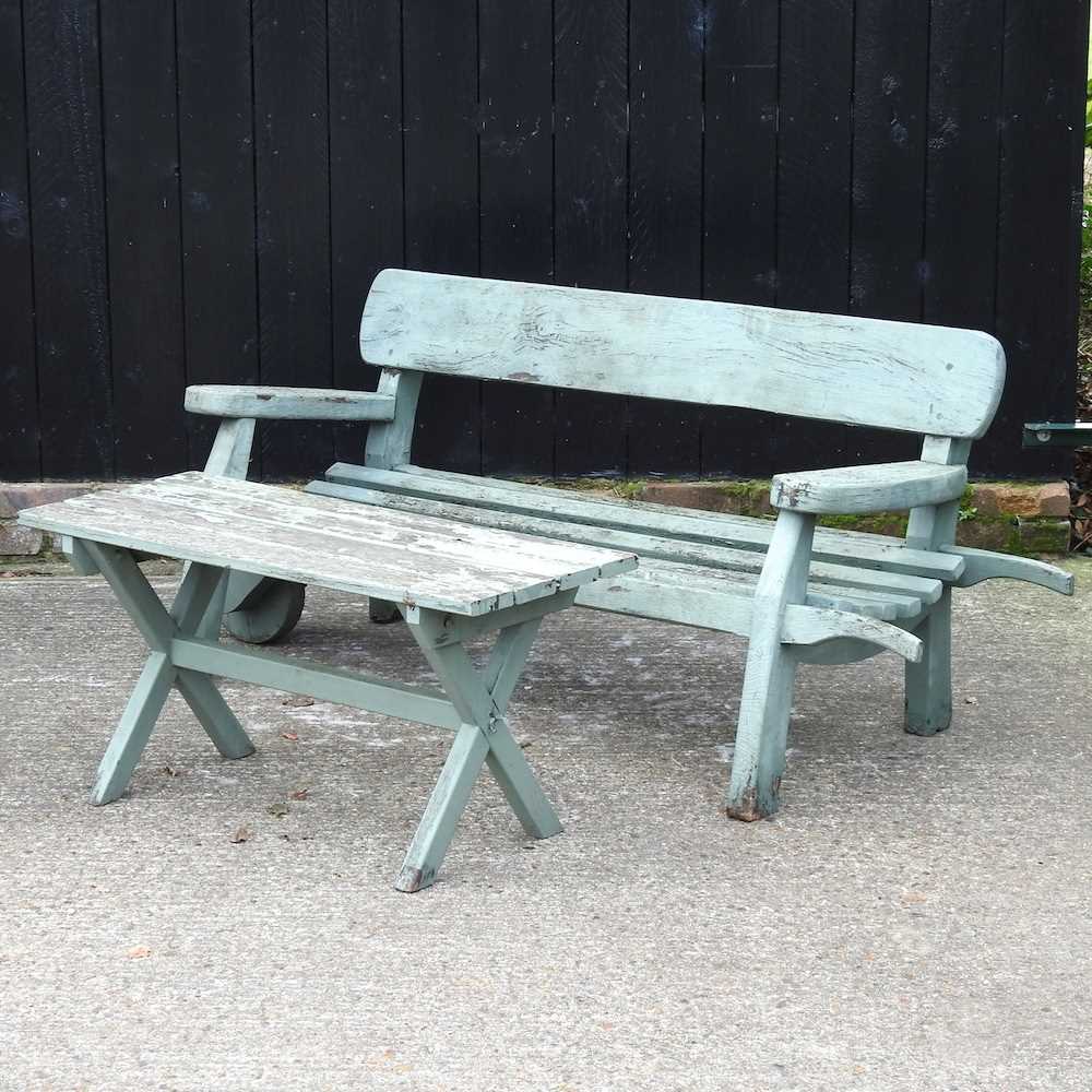 Lot 413 A green painted garden bench