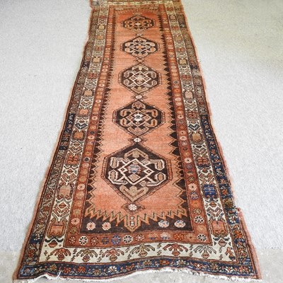 Lot 663 - A Persian runner