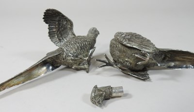 Lot 2 - A pair of early 20th century silver peppers