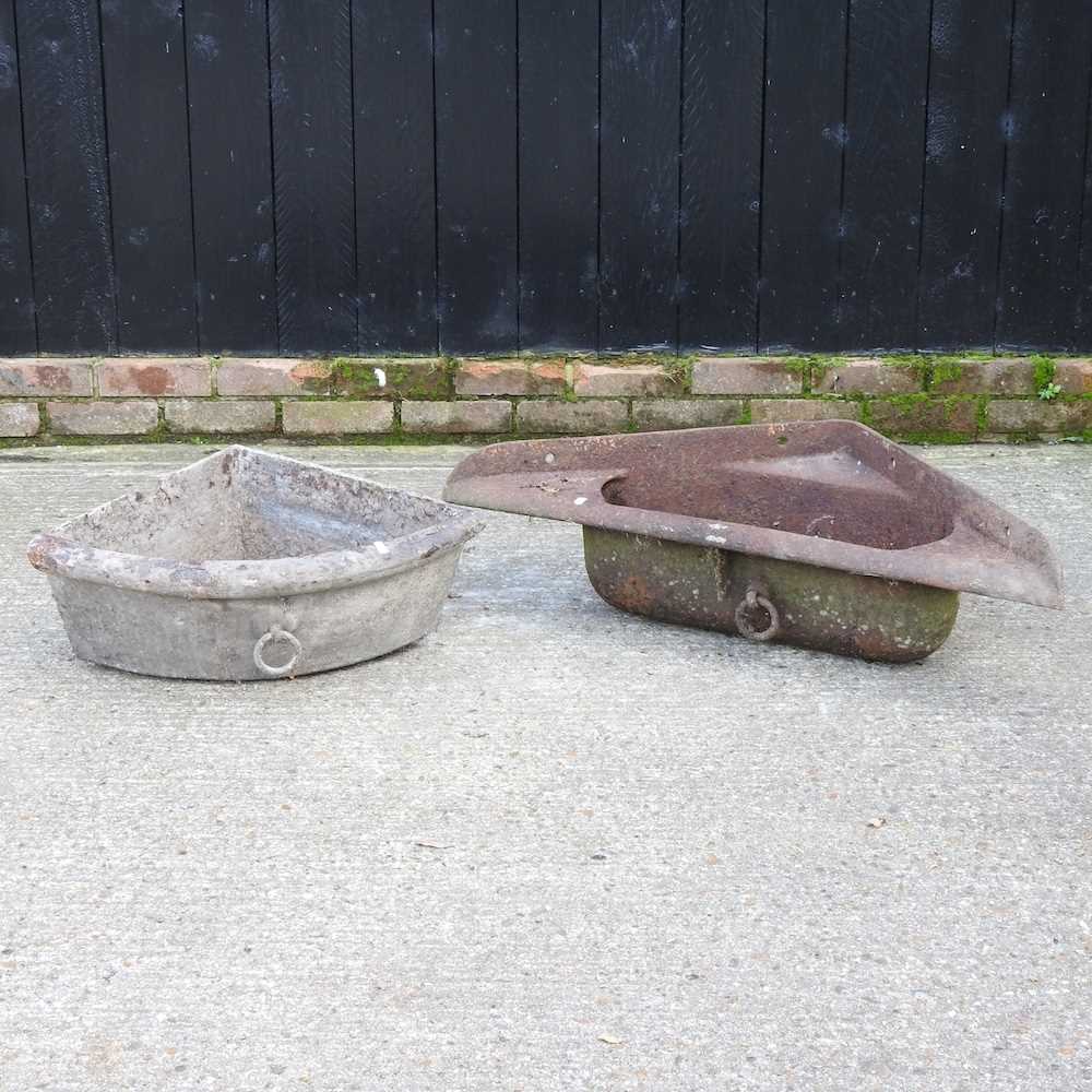 Lot 421 - A cast iron feed trough