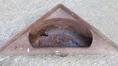 Lot 421 - A cast iron feed trough