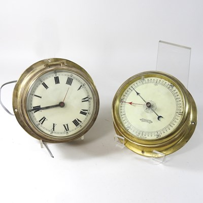 Lot 47 - A vintage brass cased ship's clock