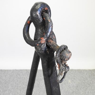 Lot 31 - A black painted iron ship's anchor