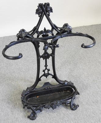 Lot 16 - A black painted cast iron stickstand