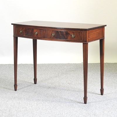 Lot 809 - A George III style mahogany bow front side table