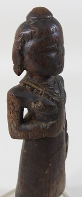 Lot 168 - A small carved tribal figure