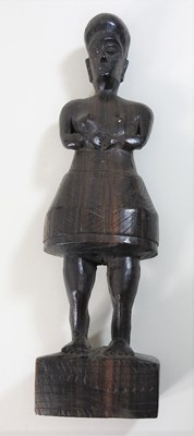 Lot 168 - A small carved tribal figure