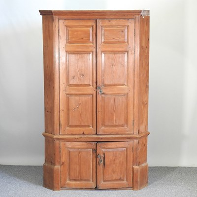 Lot 508 - A 19th century pine standing corner cupboard