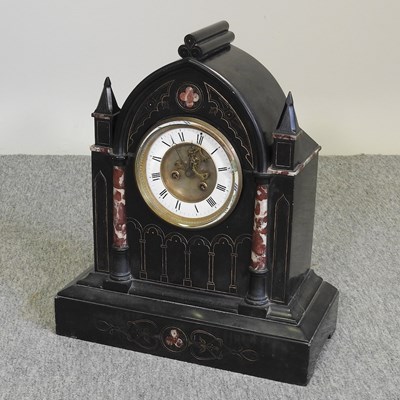 Lot 519 - A 19th century slate mantel clock