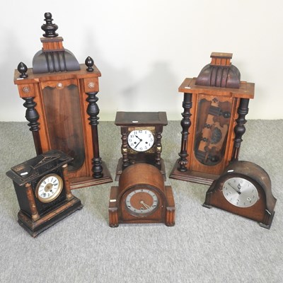 Lot 231 - A collection of 19th century and later clocks and cases