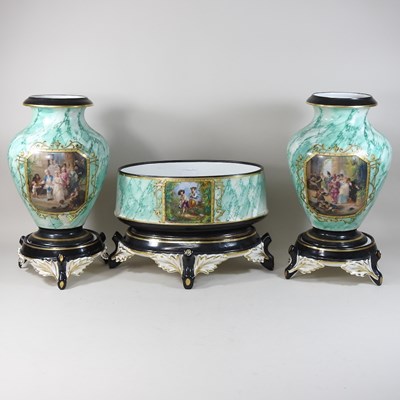 Lot 230 - An early 20th century French garniture of three vases