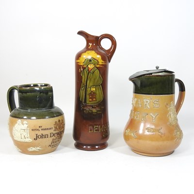 Lot 31 - Three Doulton Dewar's whisky jugs