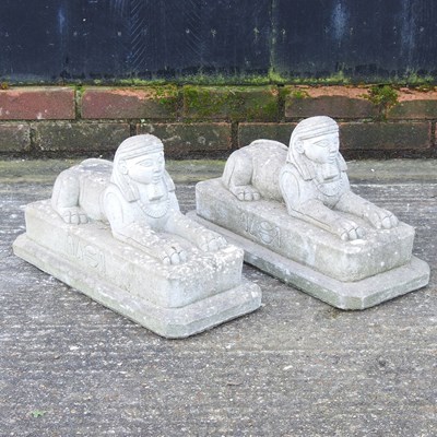 Lot 254 - A pair of reconstituted stone models of sphinxes