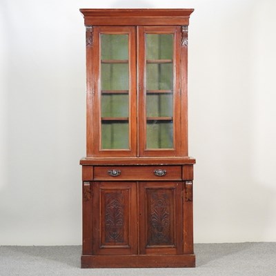 Lot 664 - An Edwardian mahogany cabinet bookcase