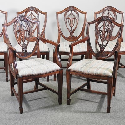 Lot 581 - A set of six shield back dining chairs