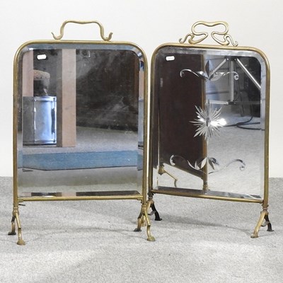 Lot 599 - Two Art Nouveau brass and mirrored fire screens