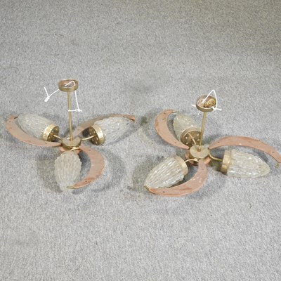 Lot 160 - A pair of mid 20th century three branch ceiling lights