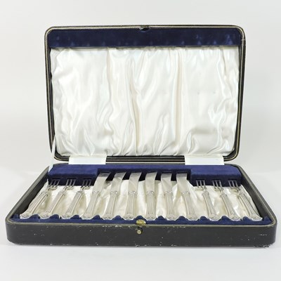 Lot 53 - A set of silver fruit knives and forks