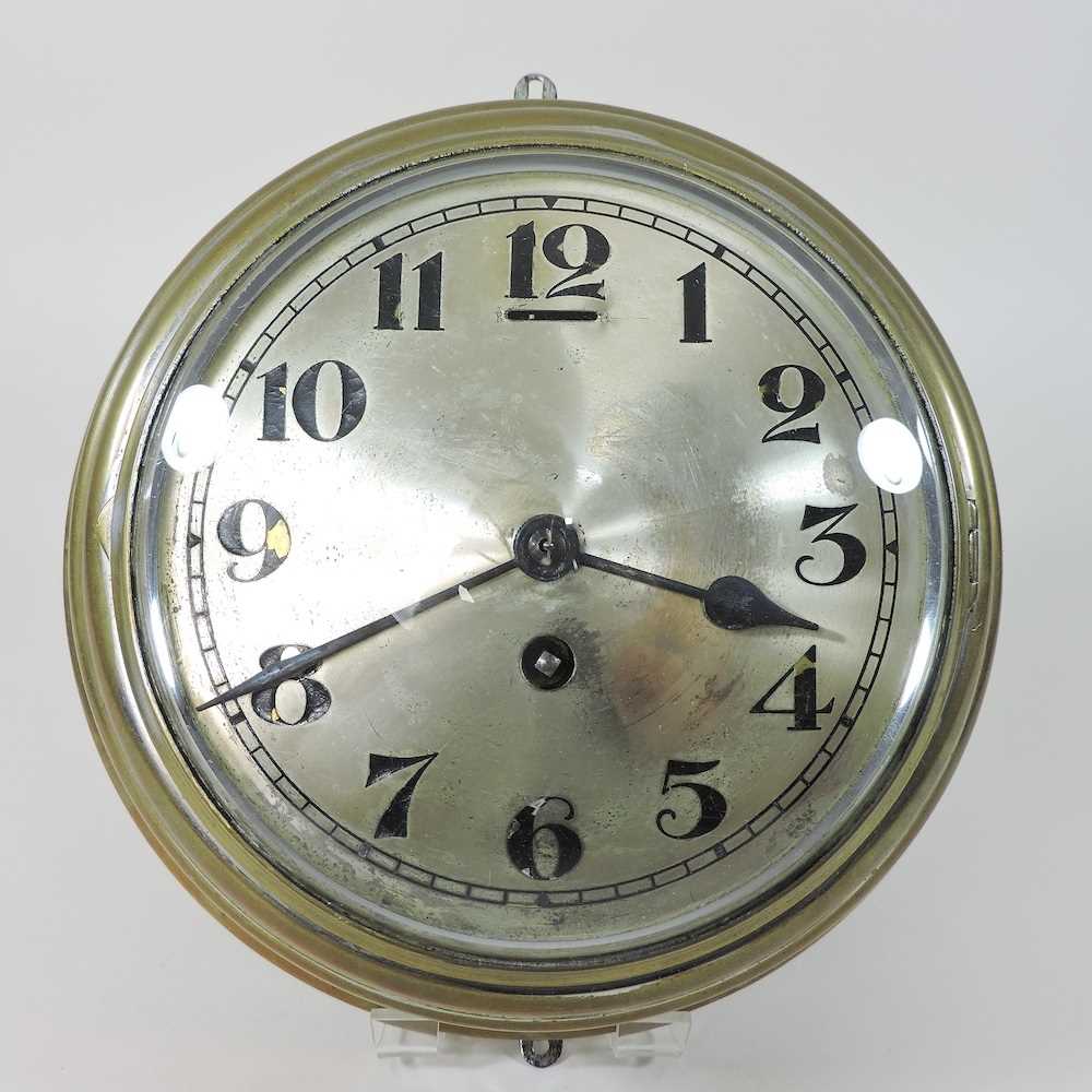 Lot 61 - An early 20th century brass cased bulkhead