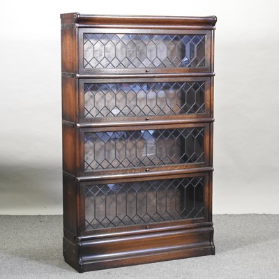 Lot 465 - An early 20th century Globe Wernicke graduated four tier glazed sectional bookcase