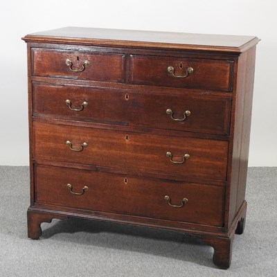 Lot 522 - A George III oak chest