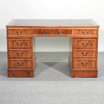 Lot 652 - A yew wood reproduction pedestal desk