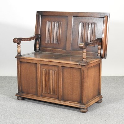 Lot 574 - A 1920s monk's bench