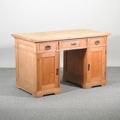 Lot 375 - An Edwardian pine pedestal desk